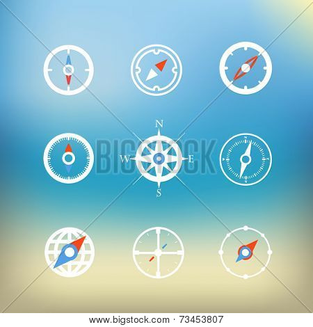 White compass icons clip-art on color background. Design elements