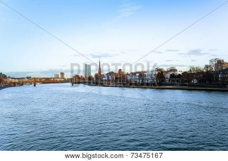 FRANKFURT, HESSE - February 12 : River view of The Eiserner Steg.The Eiserner Steg is a pedestrian bridge in Frankfurt am Main built in 1868. City skyline on February 12, 2014 in Frankfurt, Germany.