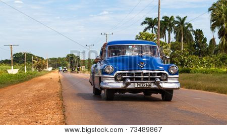 HAVANA,CUBA - June 23, 2014: Blue classic car on the road in the inland
