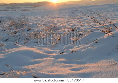 Sunset over winter landscape
