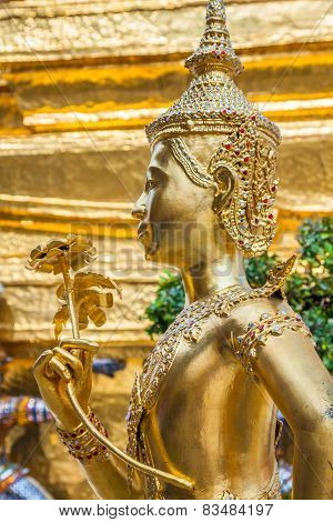 Golden Kinnari Statue At Temple Of Emerald Buddha (wat Phra Kaew) In Grand Royal Palace. Bangkok, Th