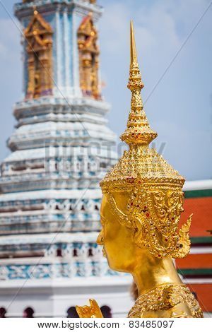 Golden Kinnari Statue At Temple Of Emerald Buddha (wat Phra Kaew) In Grand Royal Palace. Bangkok, Th