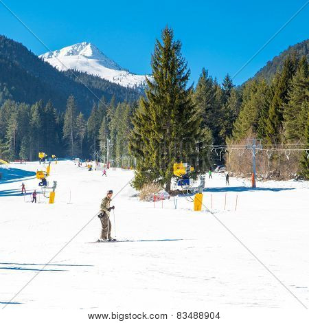 Skiers on the slope in Bansko, Bulgaria