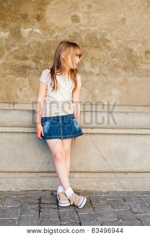 Outdoor portrait of a cute little girl