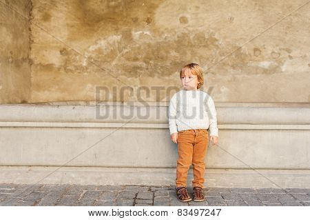 Outdoor portrait of a cute little boy