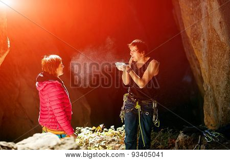 two climbers in a cave