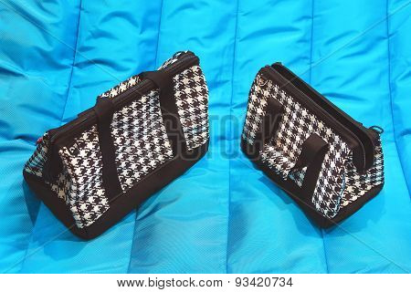 Bags On Blue Background