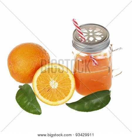 Orange juice in a mason jar glass