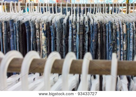 Jeans background hanging around. The view from the other side