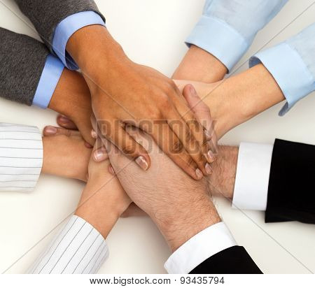 business, succcess and winning concept - group of businesspeople celebrating victory