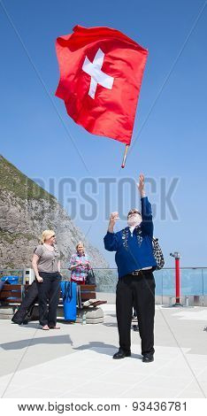 MOUNT PILATUS - JULY 13: Unidentified man demonstrating traditional swiss 