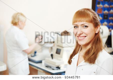 Opphthalmology. Female optometrist optician doctor portrait in eye medic clinic 