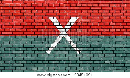 Flag Of Kachin Independence Army Painted On Brick Wall