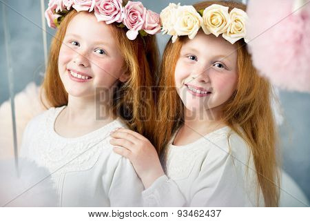 Cute twins sisters