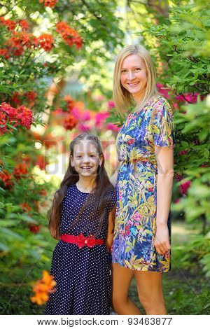 young mother with daughter in park