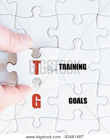 Last Puzzle Piece With Business Acronym Tg