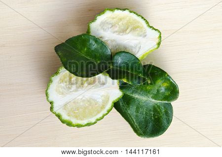 Bergamot Fruit With Leaf On Wooden Board