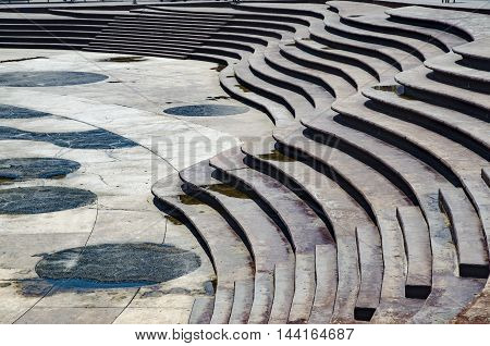 Stairs Architecture background. flat and circular staircase that surrounds a large area