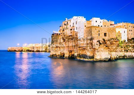 Puglia Italy. Sunset scenery of Polignano a Mare town in the province of Bari Apulia southern Italia on the Adriatic Sea