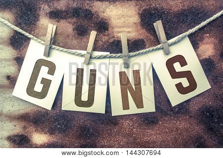 Guns Concept Pinned Stamped Cards On Twine Theme