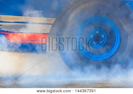Drag Racing Car Burns Rubber Off Its Tires In Preparation For The Race