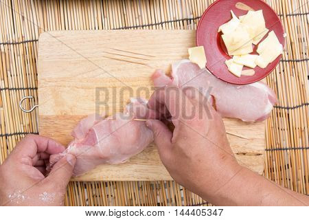 Chef putting cheese in pork / Cooking Japanese pork curry concept