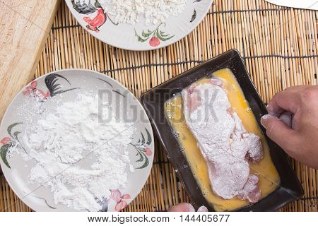 pork and flour with bread crumb for cooking tongkatsu / Cooking Japanese pork curry concept