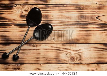 Plastic Black Shoetree On The Vintage Textures Wooden