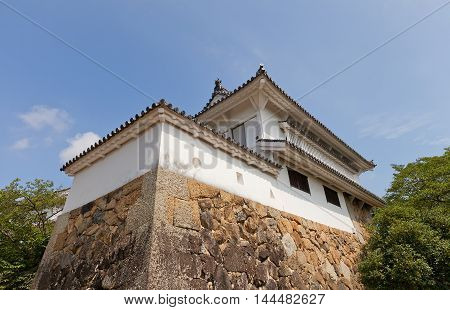 HIMEJI JAPAN - JULY 21 2016: Keishoyagura (Cosmetic) Turret in West Bailey of Himeji castle (White Egret Castle circa 1609). Himeji-jo is National Treasure of Japan and UNESCO World Heritage Site