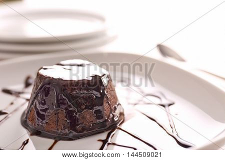 Chocolate fondant cake on the plate