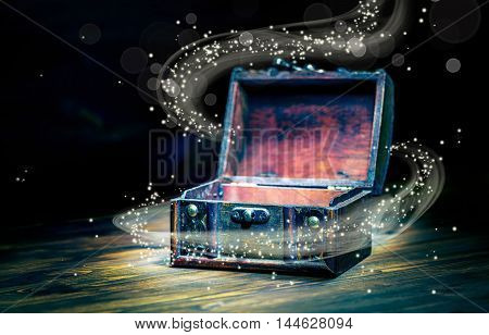 Beautiful Concept Greeting Card Of Opened Vintage Chest Treasure With Miracle Magic Light On Wooden