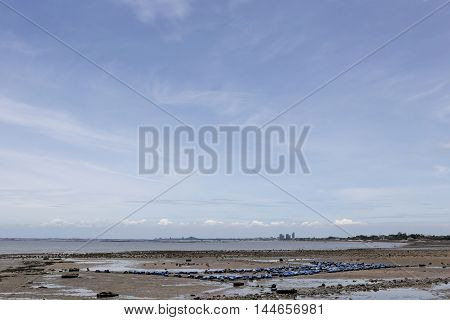 Seaside of Coast Beach on time low tide and blue sky background.