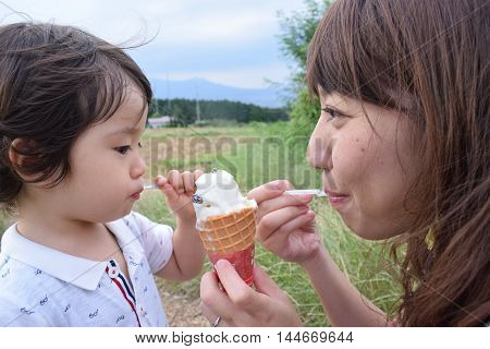 Mother And Her Son Are Palying Outer Place