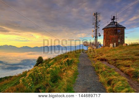 Communications station and amazing morning in Gerlitzen Apls in Austria.View of the mountains in Slovenia.HDR Image