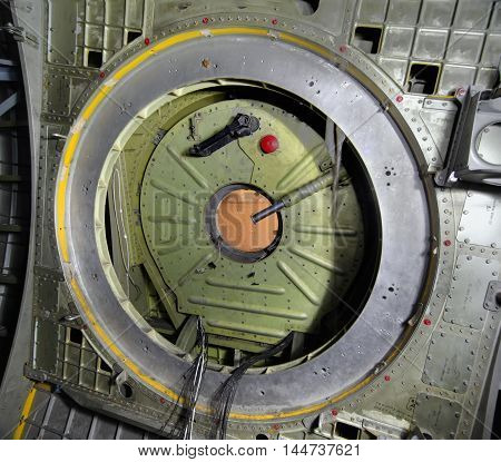 Hermetic closed the hatch of the space shuttle Buran. Inside view