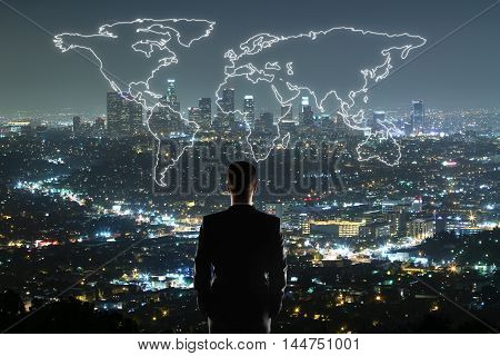 Travel concept with businessman looking at anstract map on illuminated night city background
