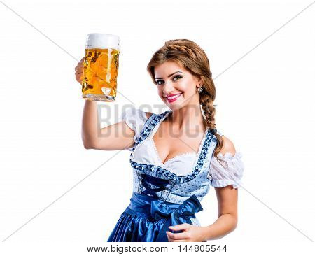 Woman In Traditional Bavarian Dress Holding Mug Of Beer