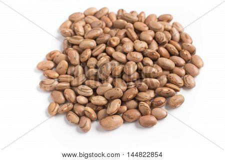 Raw Carioca Beans close-up in white background
