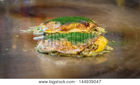 Hiroshima original signature Okonomiyaki japanese pizza with egg