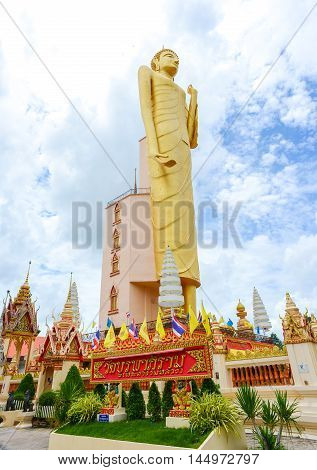 Roiet, Thailand - Aug 23 2016 : The Tallest standing Buddha image in Thailand and The Sixth in the world at Burapapiram Temple