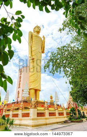 Roiet, Thailand - Aug 23 2016 : The Tallest standing Buddha image in Thailand and The Sixth in the world at Burapapiram Temple