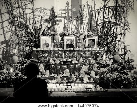 Day Of The Dead Altar With Pan De Muerto And Candles