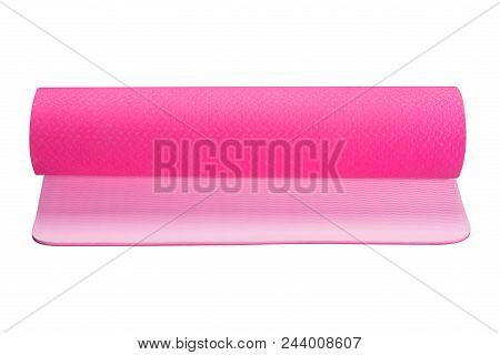 Pink Fitness Mat Or For Yoga, A Roll Is Slightly Unwound, On A White Background