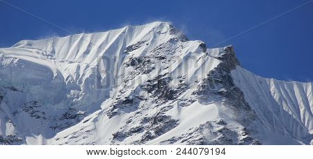 Mountain Ridge Of The Langtang Himal Range Covered By Snow And Glacier.