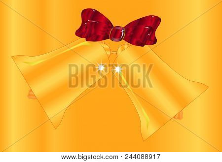 A Christmas Red Ribbon And  Two Golden Bells Isolated On A Golden Background