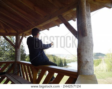 Latvia Madona. The Boy Enjoys The Landscape.