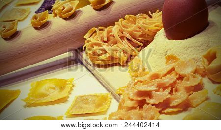 Organic Ingredients To Make Homemade Fresh  Pasta With Flour And Eggs And Vintage Effect