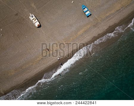 Sea Shore, Little Fishing Boats Are Parking At The Beach, Drone Brids Eye View, Sicily, Italy