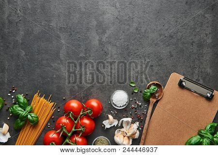 Food Background For Tasty Italian Dishes With Tomato. Various Cooking Ingredients With Spoon And Bla