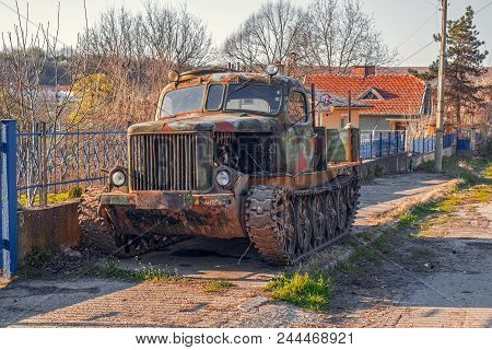 Krasen Village, Bulgaria - April 01, 2017. Old Crawler On The Side Of The Road In The Krasen Village
